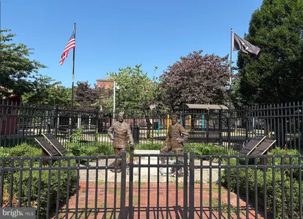 a front view of house yard and outdoor seating