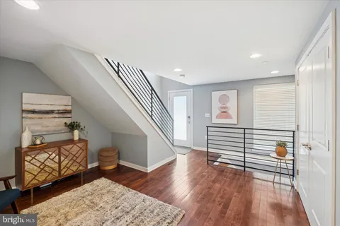 a view of entryway with wooden floor