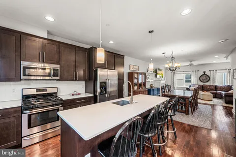 a front view of house yard and outdoor seating