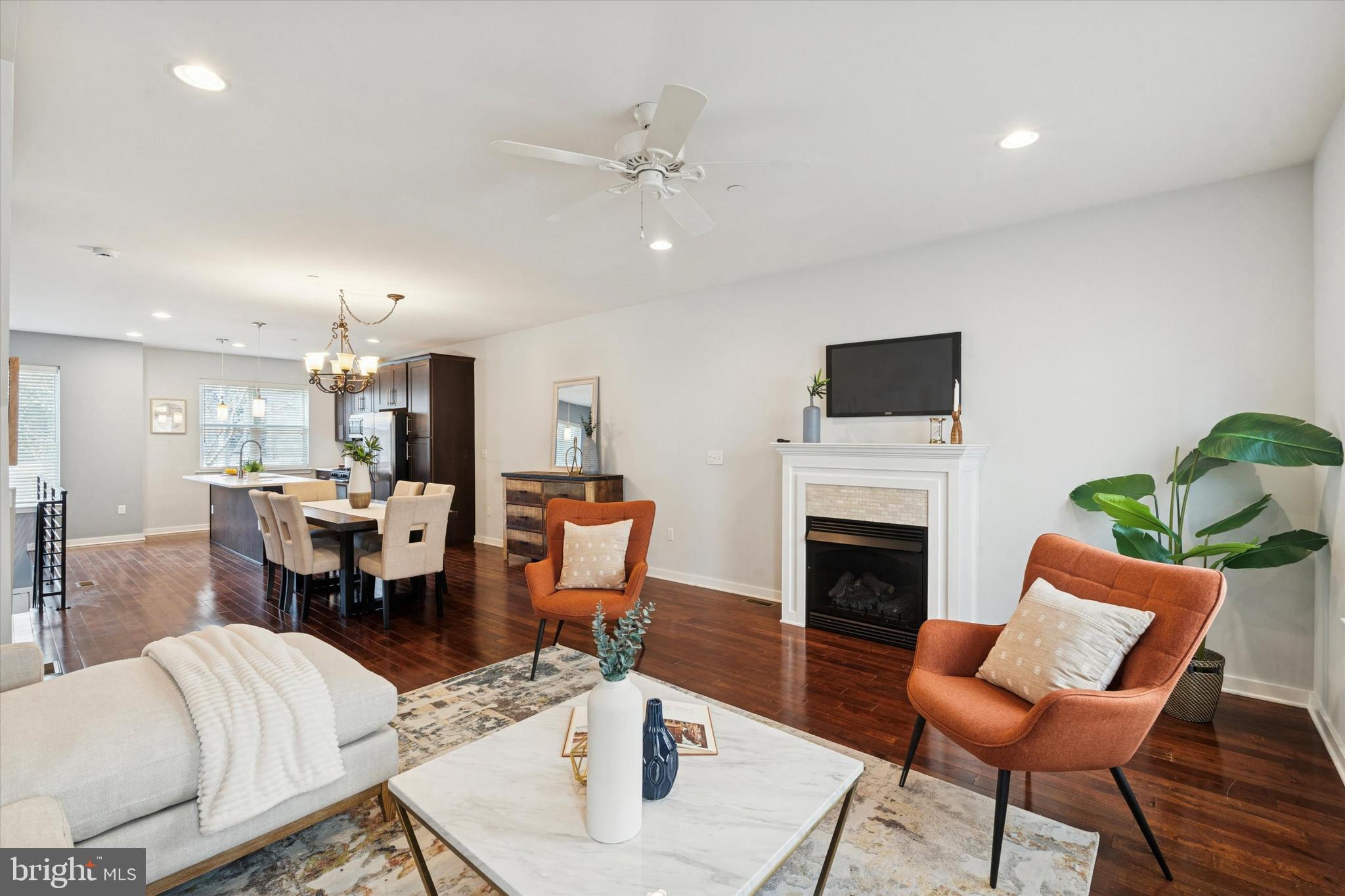 1305 South 2nd Street Philadelphia, PA 19147 - Photo 9 of 30 a living room with furniture a fireplace and a flat screen tv