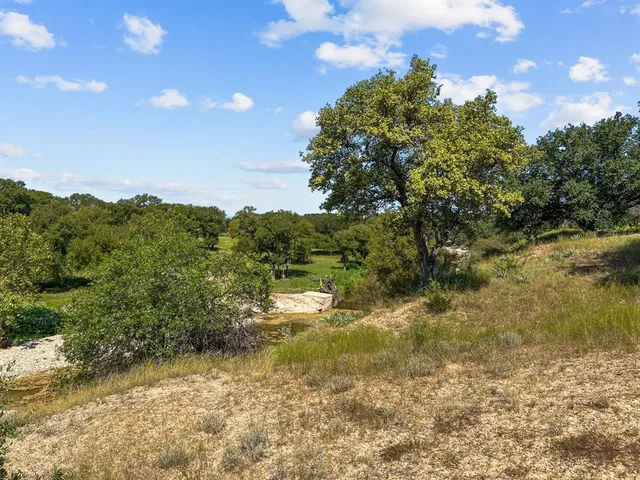 a view of a lake from a balcony