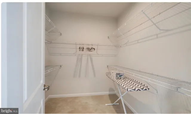 a view of a room with racks on the wall