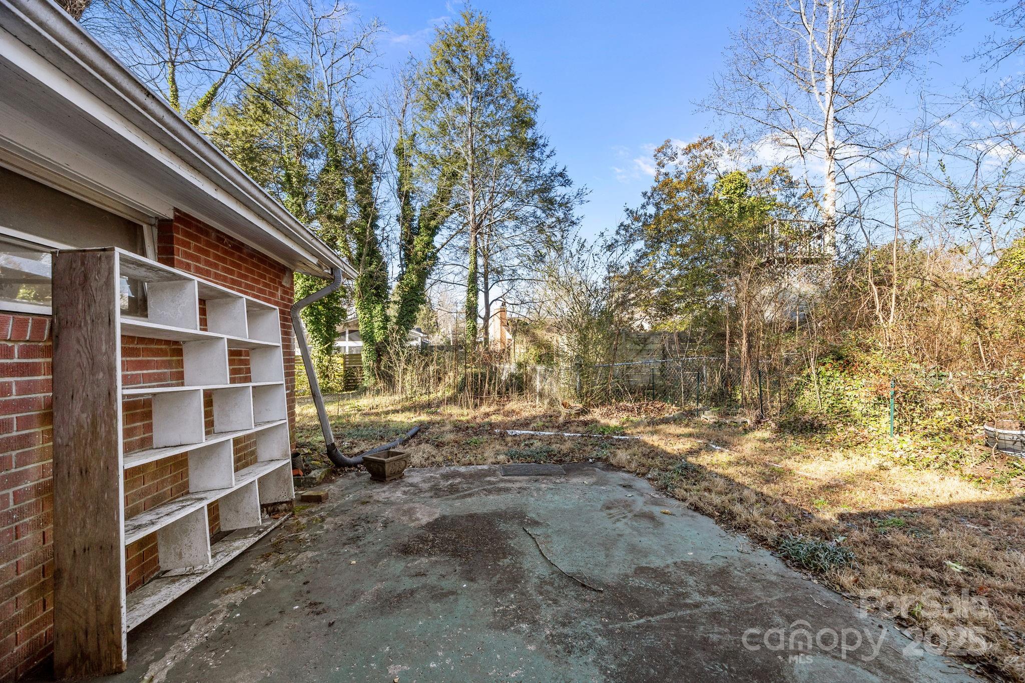 228 Grove Street Brevard, NC 28712 - Photo 35 of 44 a view of backyard and wooden house