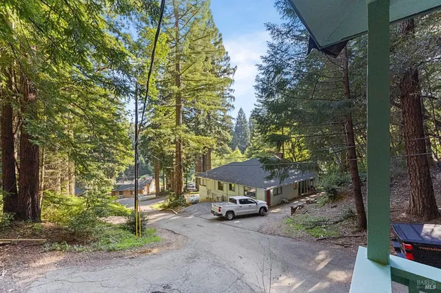 a view of a dining area with furniture window and outside view