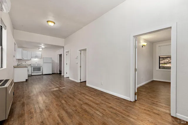 a bathroom with a bathtub and a toilet