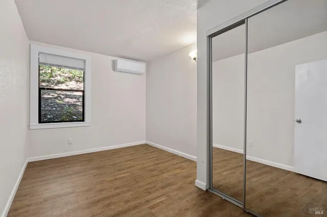 a stove top oven sitting inside of a kitchen
