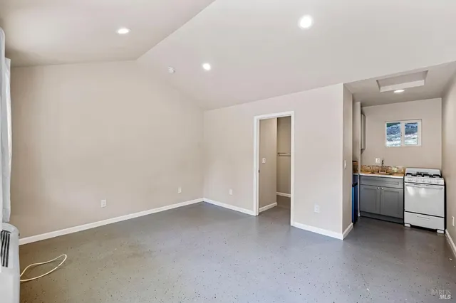 a backyard of a house with lots of green space