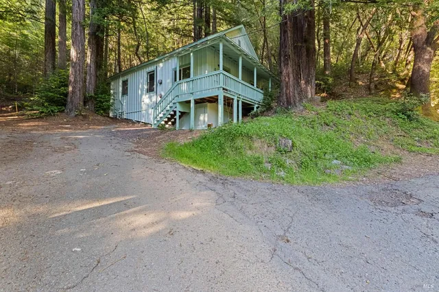 a city room with lots of residential furniture and a window