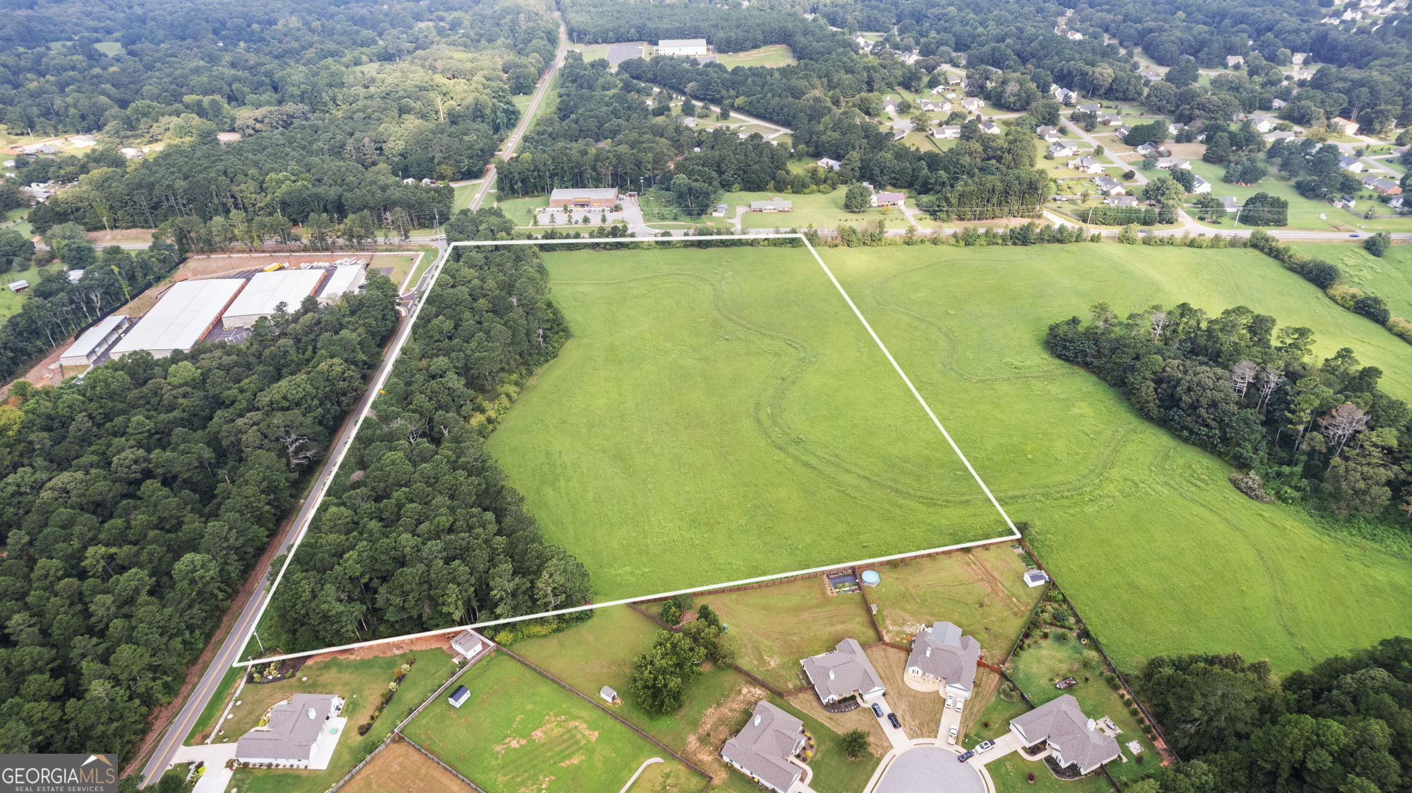 0 Tanners Bridge Road Bethlehem, GA 30620 - Photo 1 of 1 a view of a swimming pool with a yard
