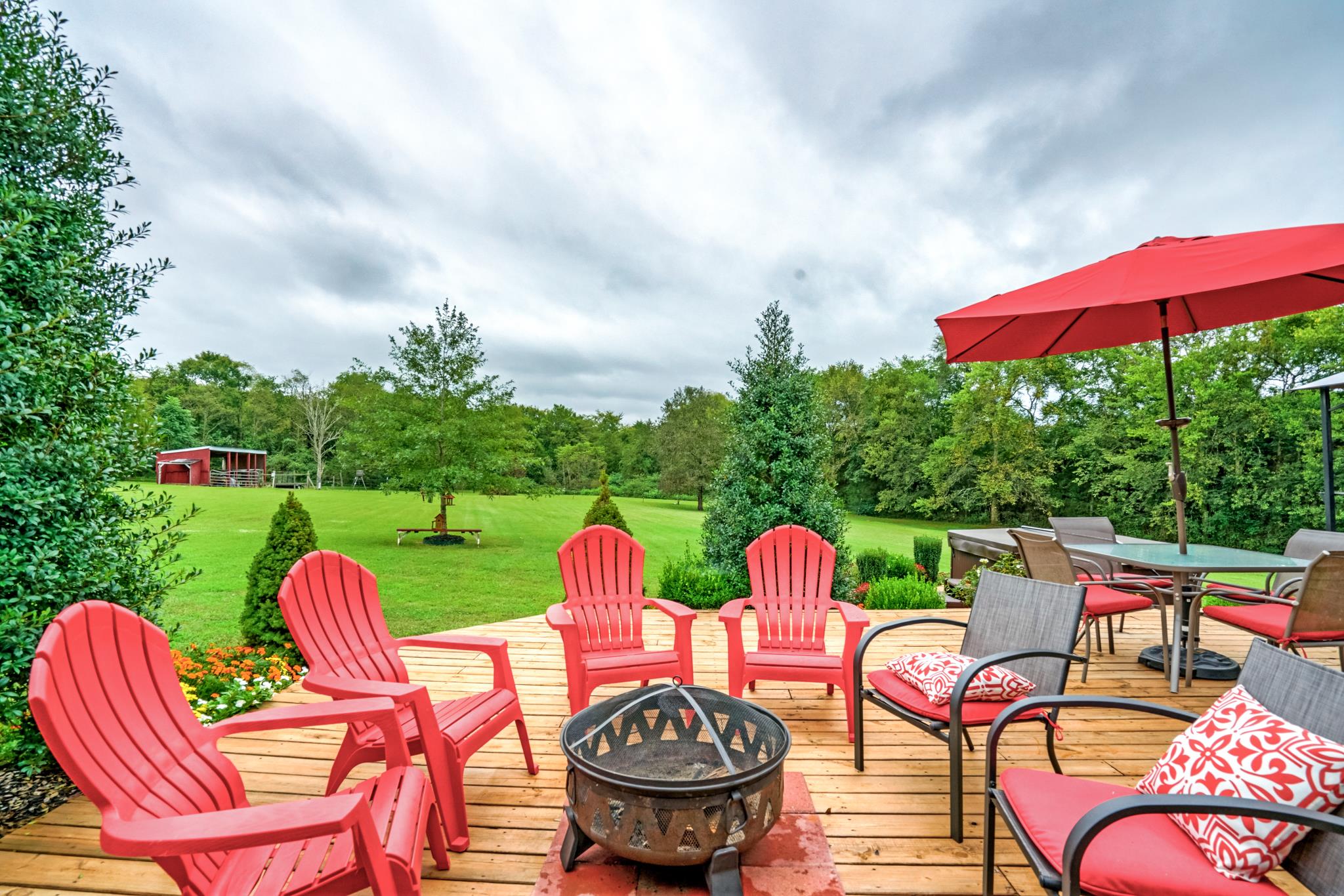 360 Tracy Road Watertown, TN 37184 - Photo 1 of 30 a view of a chairs and table in the patio