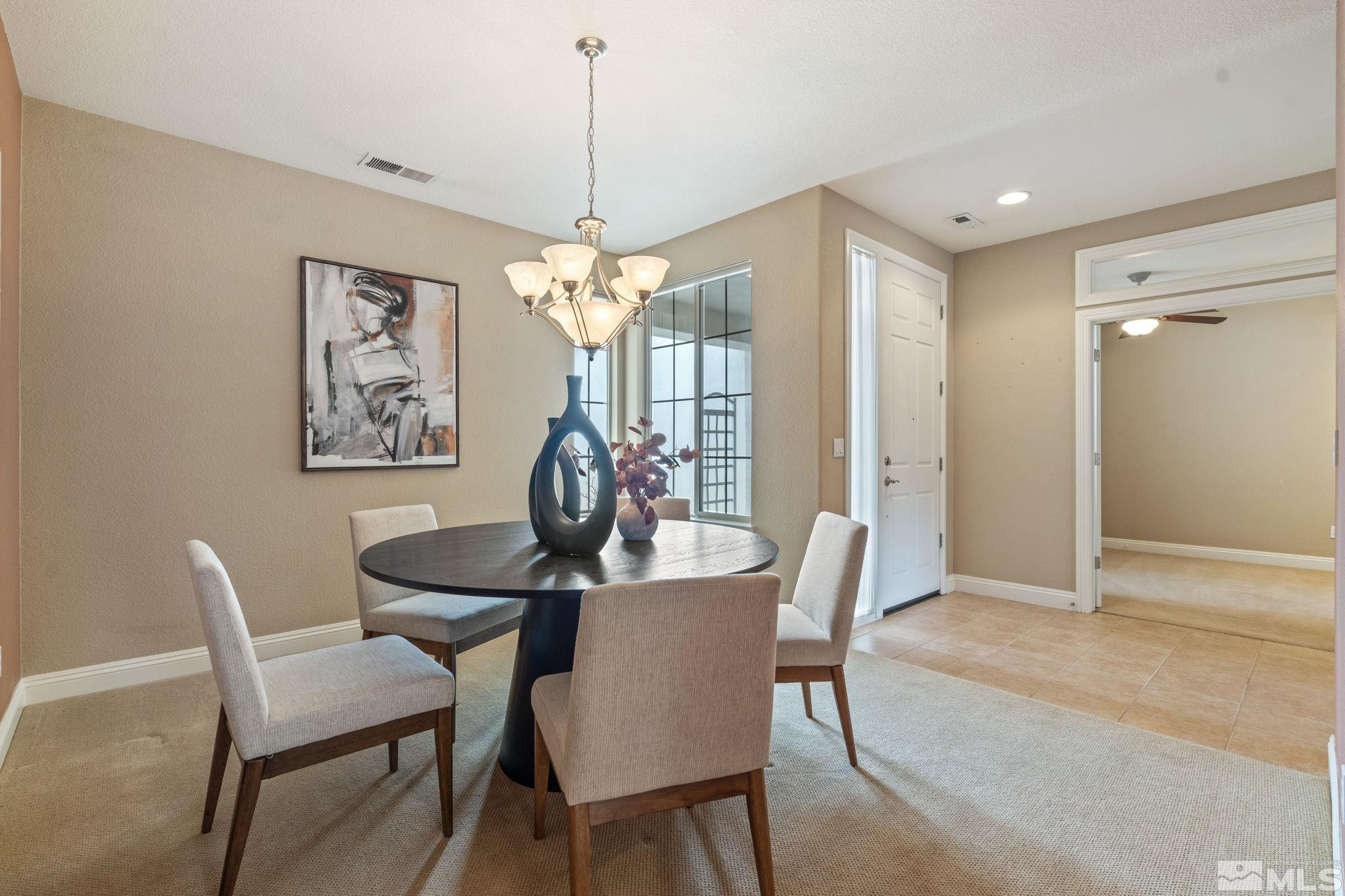 610 Aberdeen Court Reno, NV 89521 - Photo 29 of 40 a dining room with furniture and window