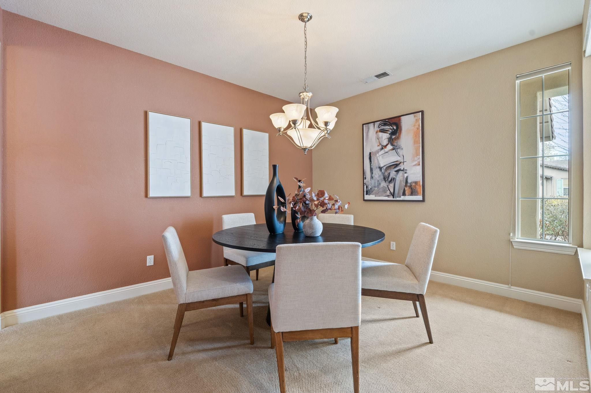 610 Aberdeen Court Reno, NV 89521 - Photo 30 of 40 a dining room with furniture and window