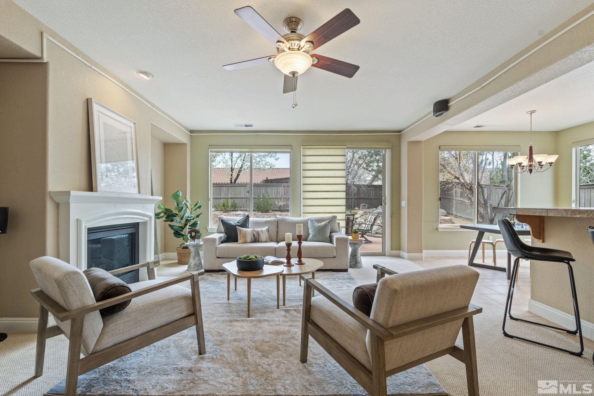 610 Aberdeen Court Reno, NV 89521 - Photo 5 of 40 a living room with furniture and a fireplace