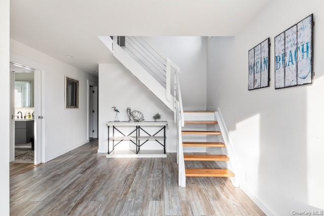 294 Wilmot Road Ocean Beach, NY 11770 - Photo 20 of 38 a view of entryway and hall with wooden floor