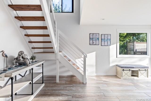 294 Wilmot Road Ocean Beach, NY 11770 - Photo 21 of 38 a view of entryway and hall with wooden floor