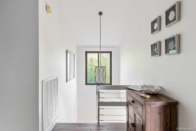 a kitchen with a stove and a window
