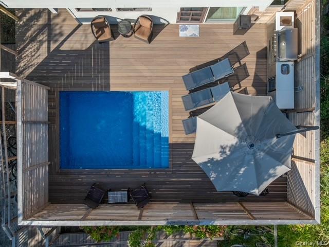 294 Wilmot Road Ocean Beach, NY 11770 - Photo 31 of 38 a view of a house with a garage