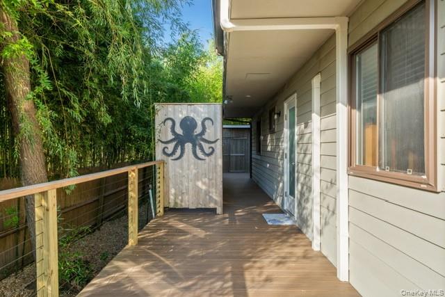 294 Wilmot Road Ocean Beach, NY 11770 - Photo 35 of 38 a view of a pathway along a building