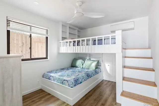 a living room with couch and a window