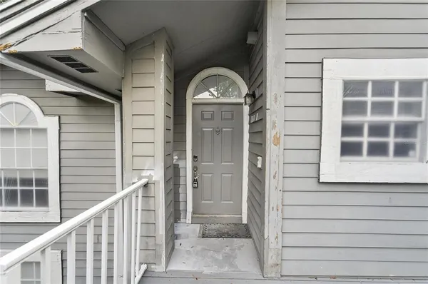 a view of a kitchen with a sink and dishwasher