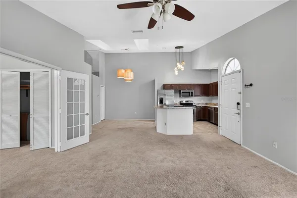 a kitchen with a stove microwave and refrigerator