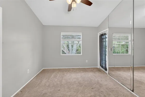 a view of a hallway with a white door