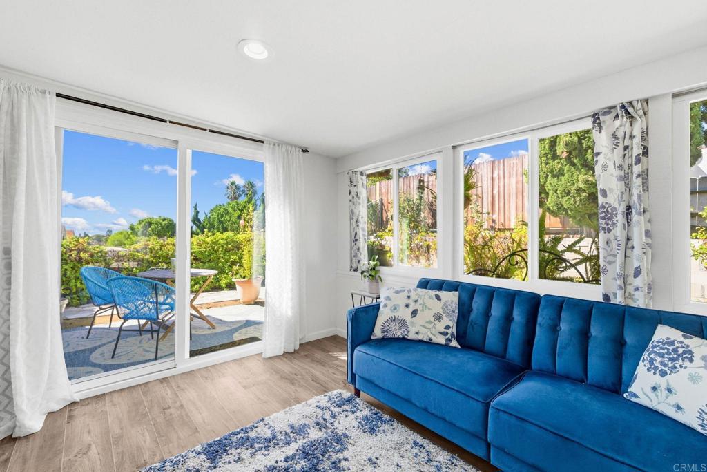 3560 Santa Maria Street Oceanside, CA 92056 - Photo 26 of 40 a living room with furniture and a large window