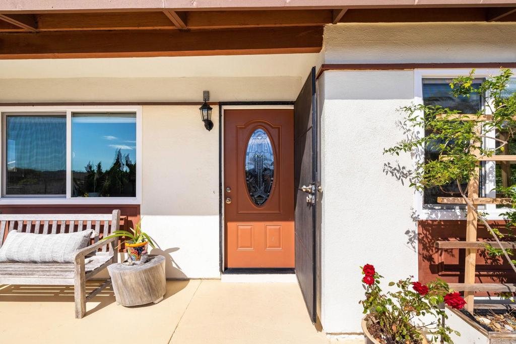 3560 Santa Maria Street Oceanside, CA 92056 - Photo 7 of 40 a front view of a house with outdoor seating and a potted plant
