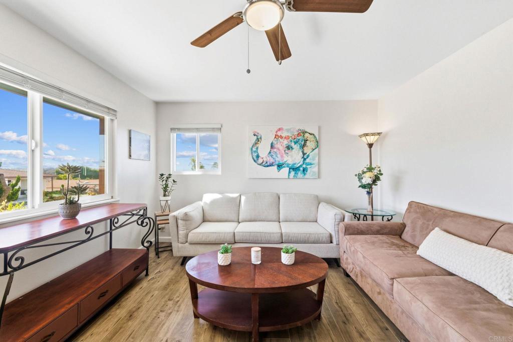 3560 Santa Maria Street Oceanside, CA 92056 - Photo 9 of 40 a living room with furniture and a large window