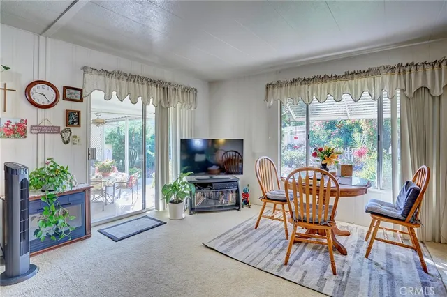 a outdoor living space with furniture and garden view