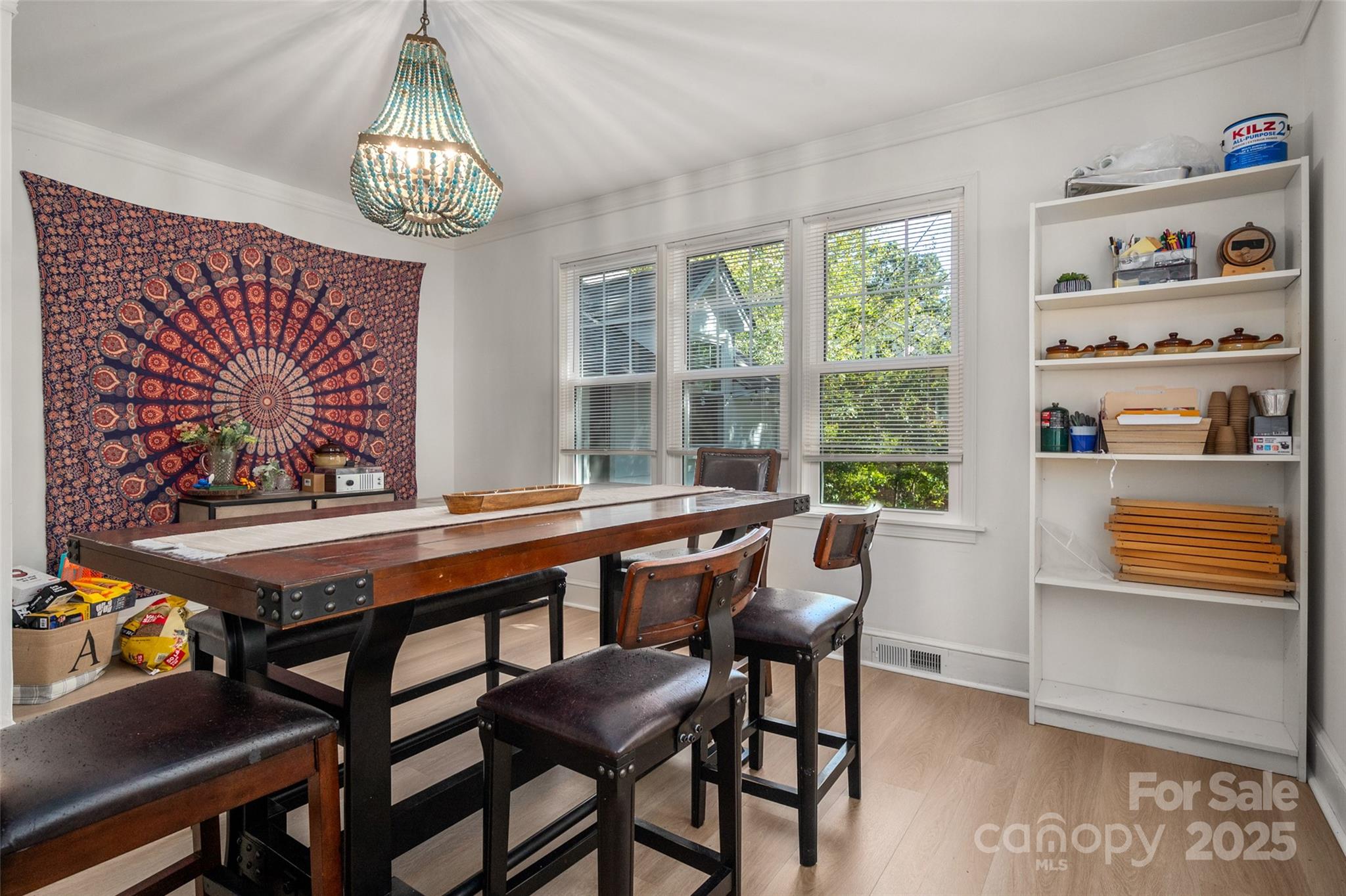 900 Chesterfield Avenue Lancaster, SC 29720 - Photo 12 of 37 a dining room with furniture a rug and a chandelier