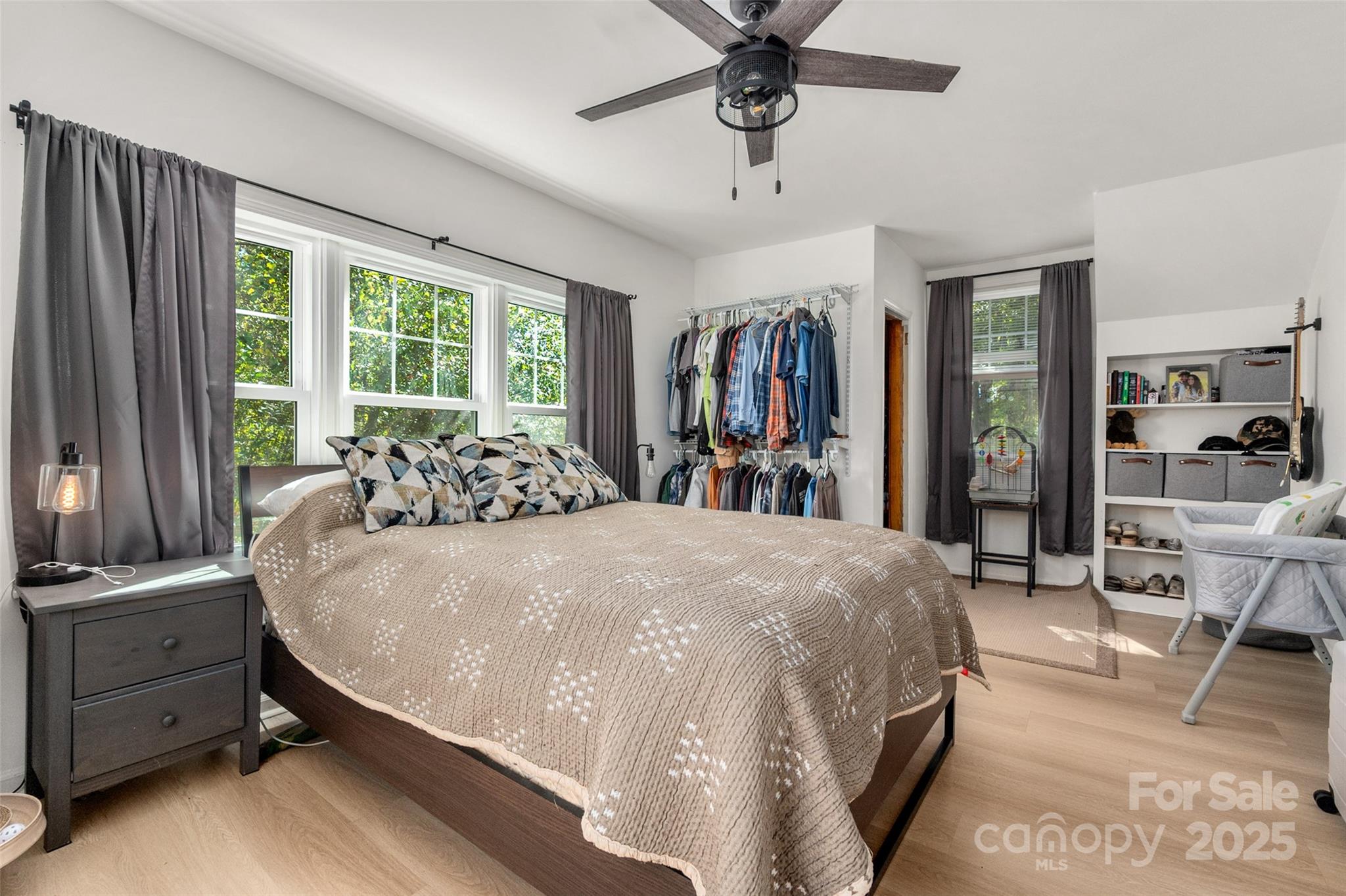 900 Chesterfield Avenue Lancaster, SC 29720 - Photo 18 of 37 a bed sitting in a spacious bedroom next to a window