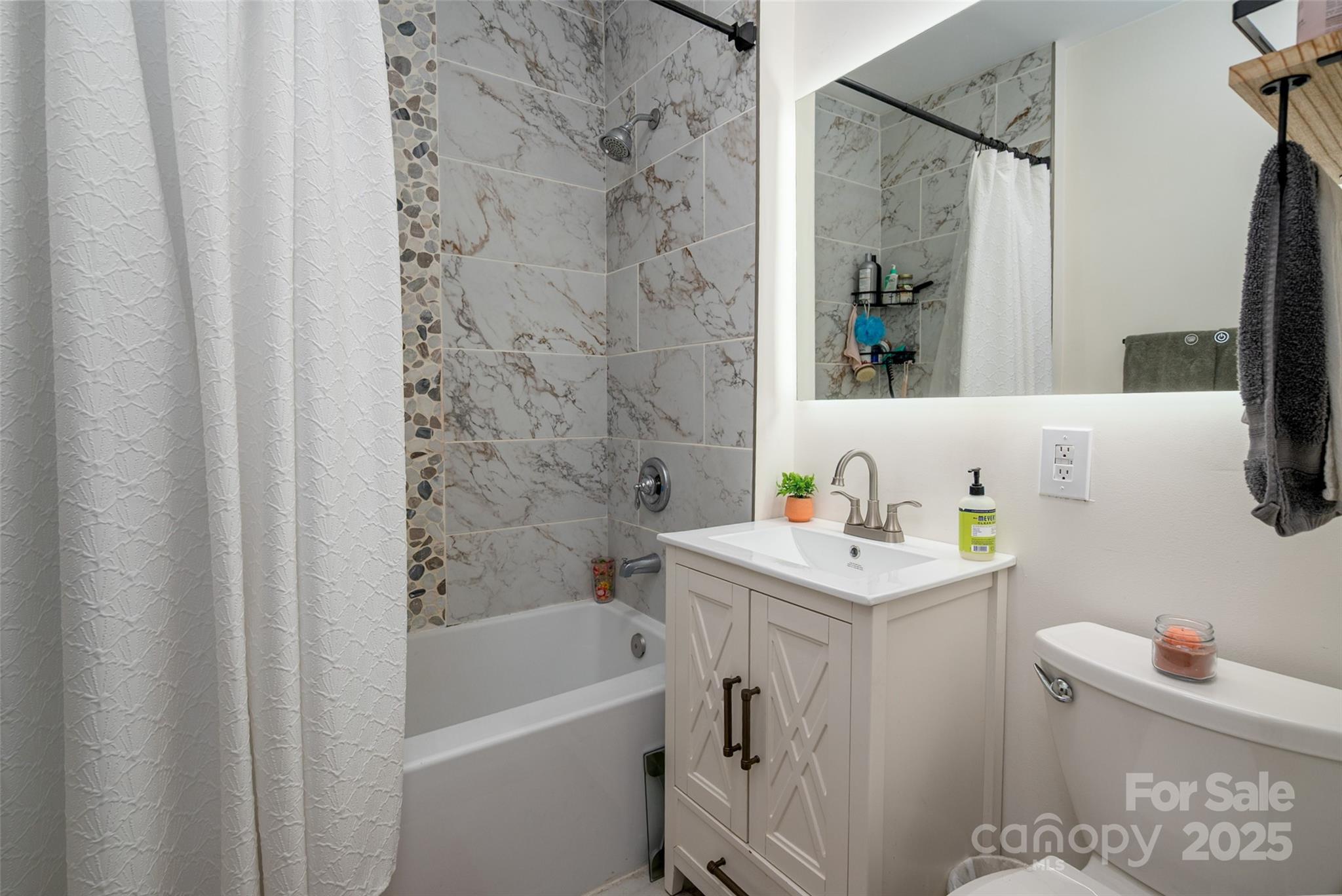 900 Chesterfield Avenue Lancaster, SC 29720 - Photo 23 of 37 a bathroom with a sink toilet and shower