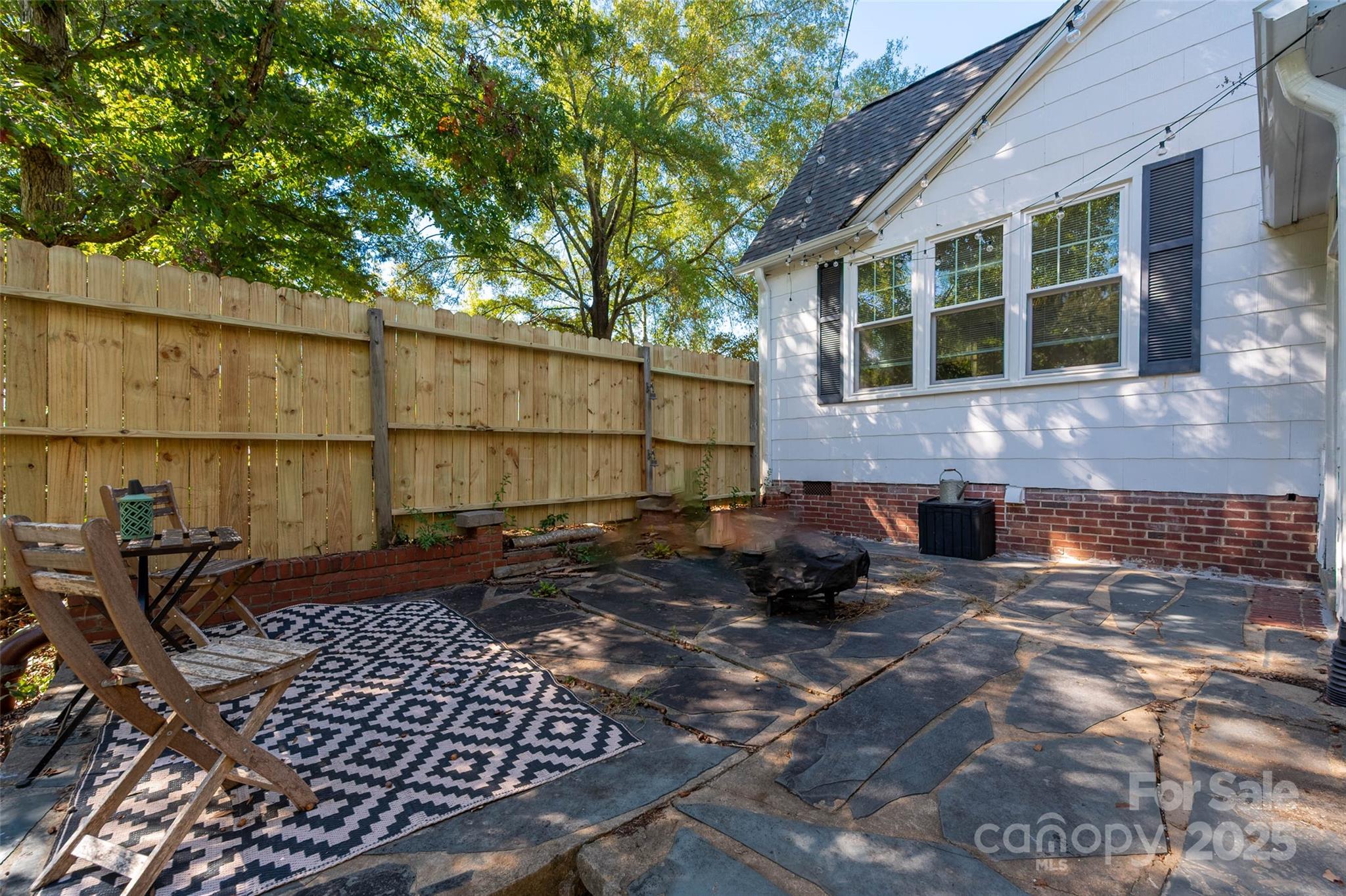 900 Chesterfield Avenue Lancaster, SC 29720 - Photo 26 of 37 a front view of a house with a yard