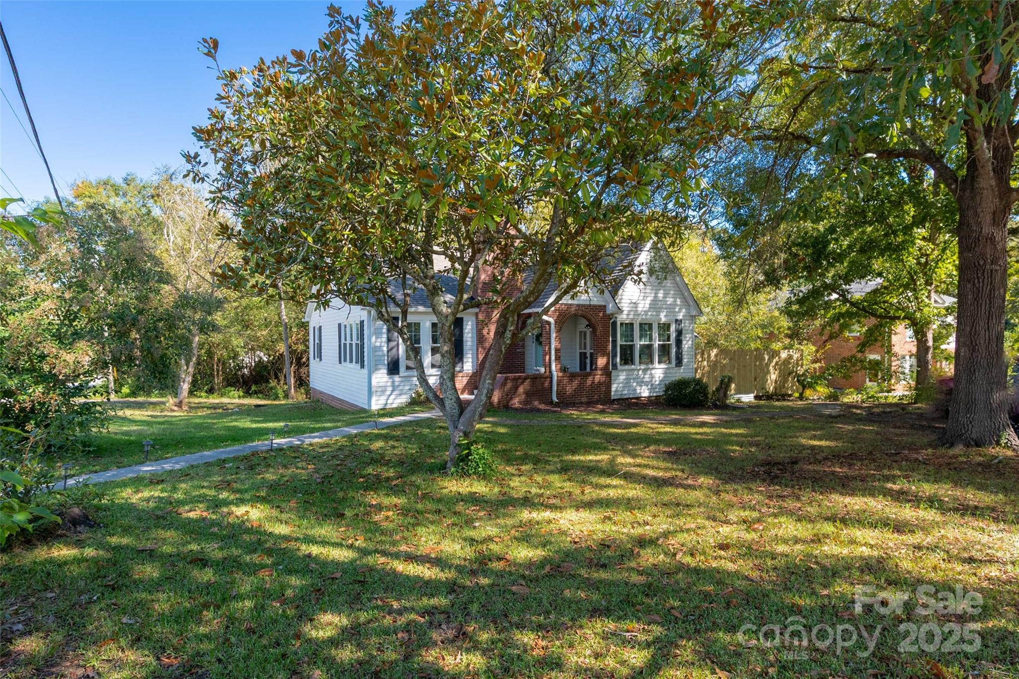 900 Chesterfield Avenue Lancaster, SC 29720 - Photo 30 of 37 a front view of a house with yard and green space