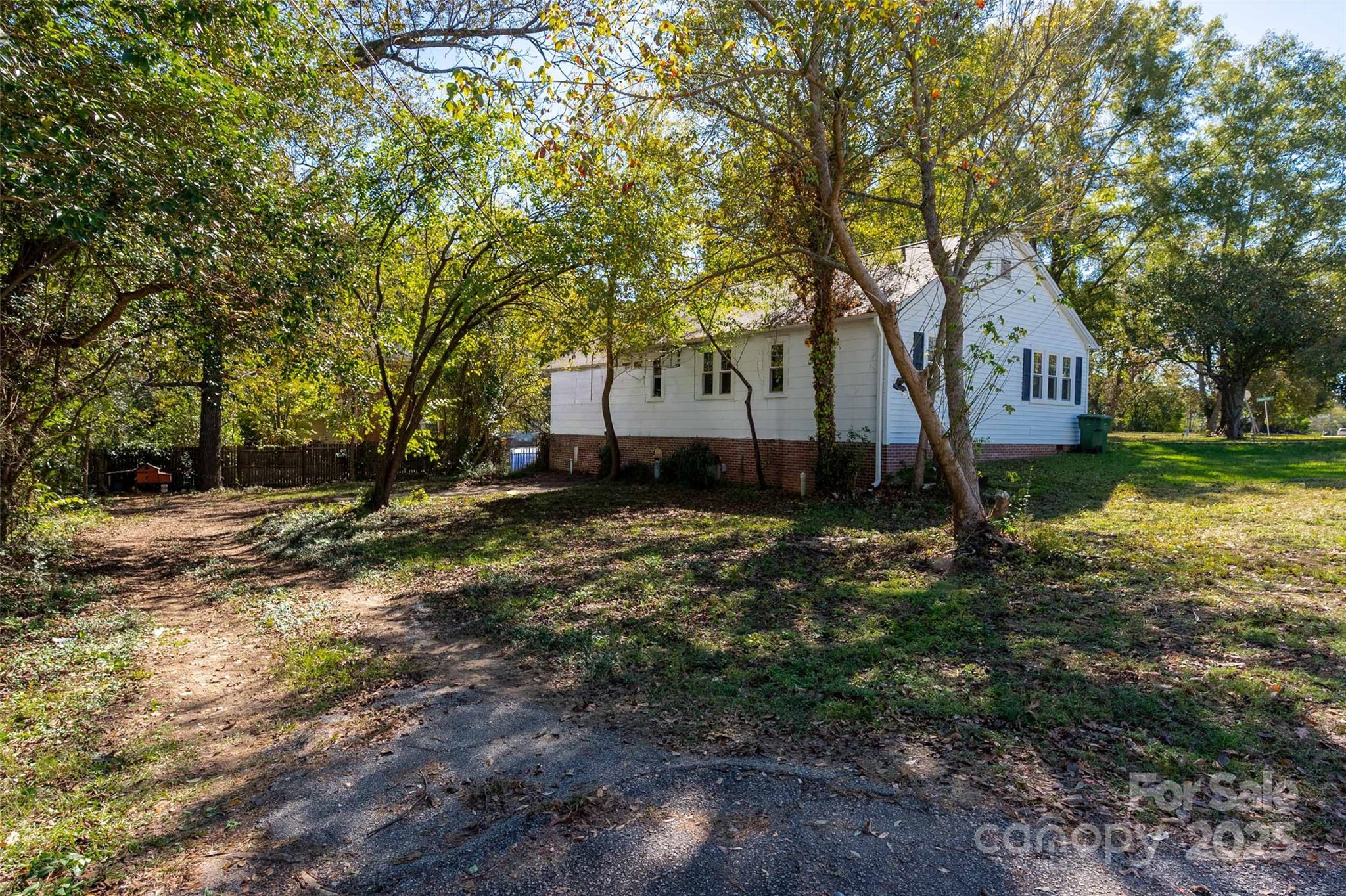 900 Chesterfield Avenue Lancaster, SC 29720 - Photo 32 of 37 a view of a house with a yard