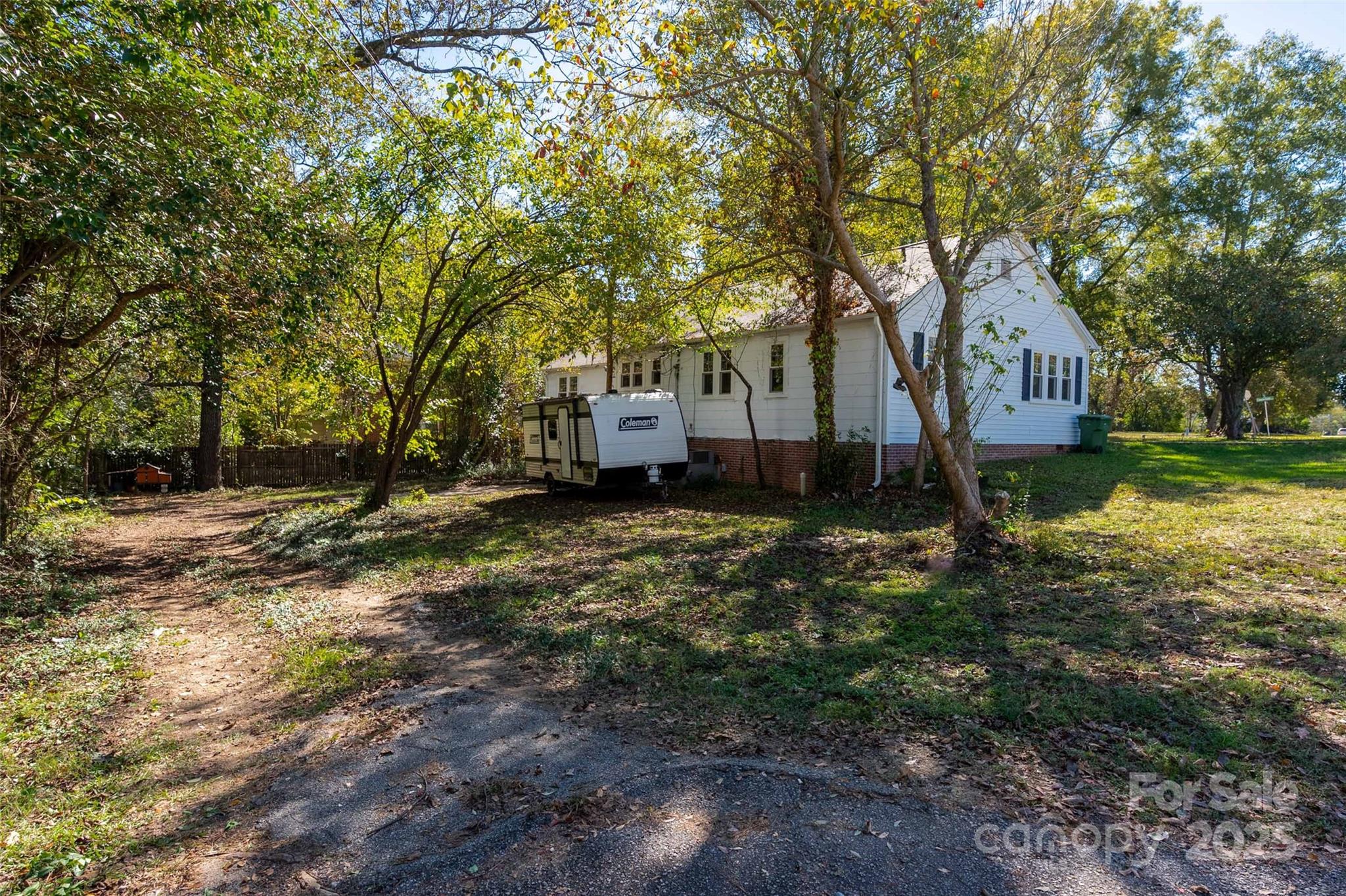 900 Chesterfield Avenue Lancaster, SC 29720 - Photo 33 of 37 a view of a house with a yard