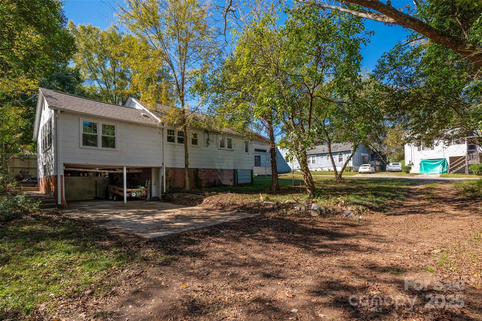 900 Chesterfield Avenue Lancaster, SC 29720 - Photo 34 of 37 a view of a house with a yard