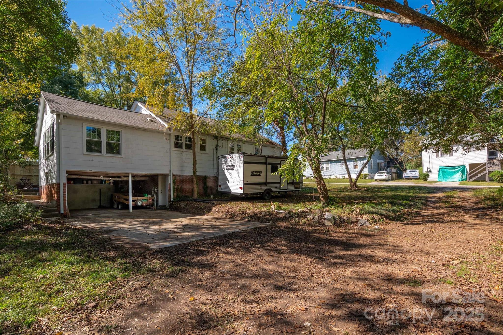 900 Chesterfield Avenue Lancaster, SC 29720 - Photo 35 of 37 a view of a house with a yard