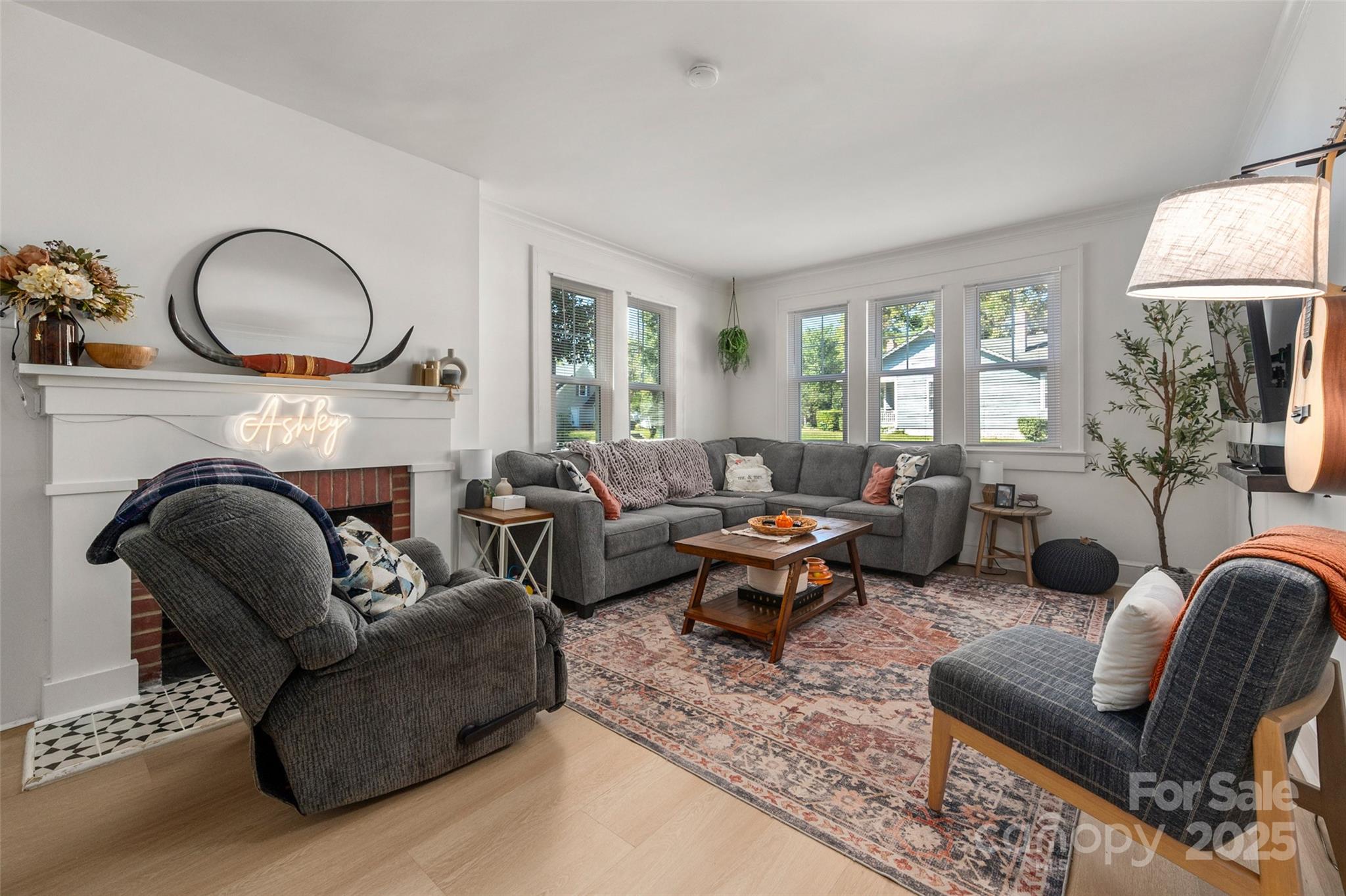 900 Chesterfield Avenue Lancaster, SC 29720 - Photo 5 of 37 a living room with furniture fireplace and a large window