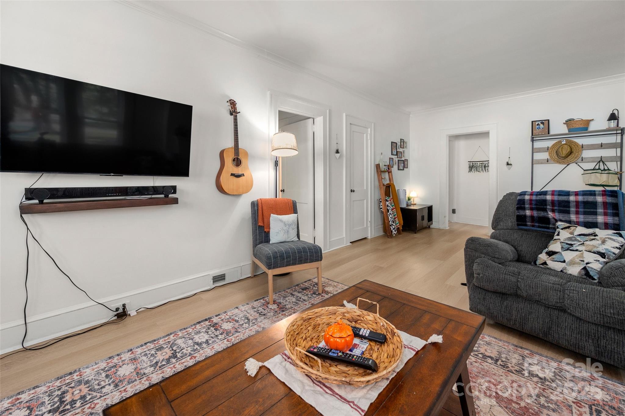 900 Chesterfield Avenue Lancaster, SC 29720 - Photo 9 of 37 a living room with furniture and a flat screen tv