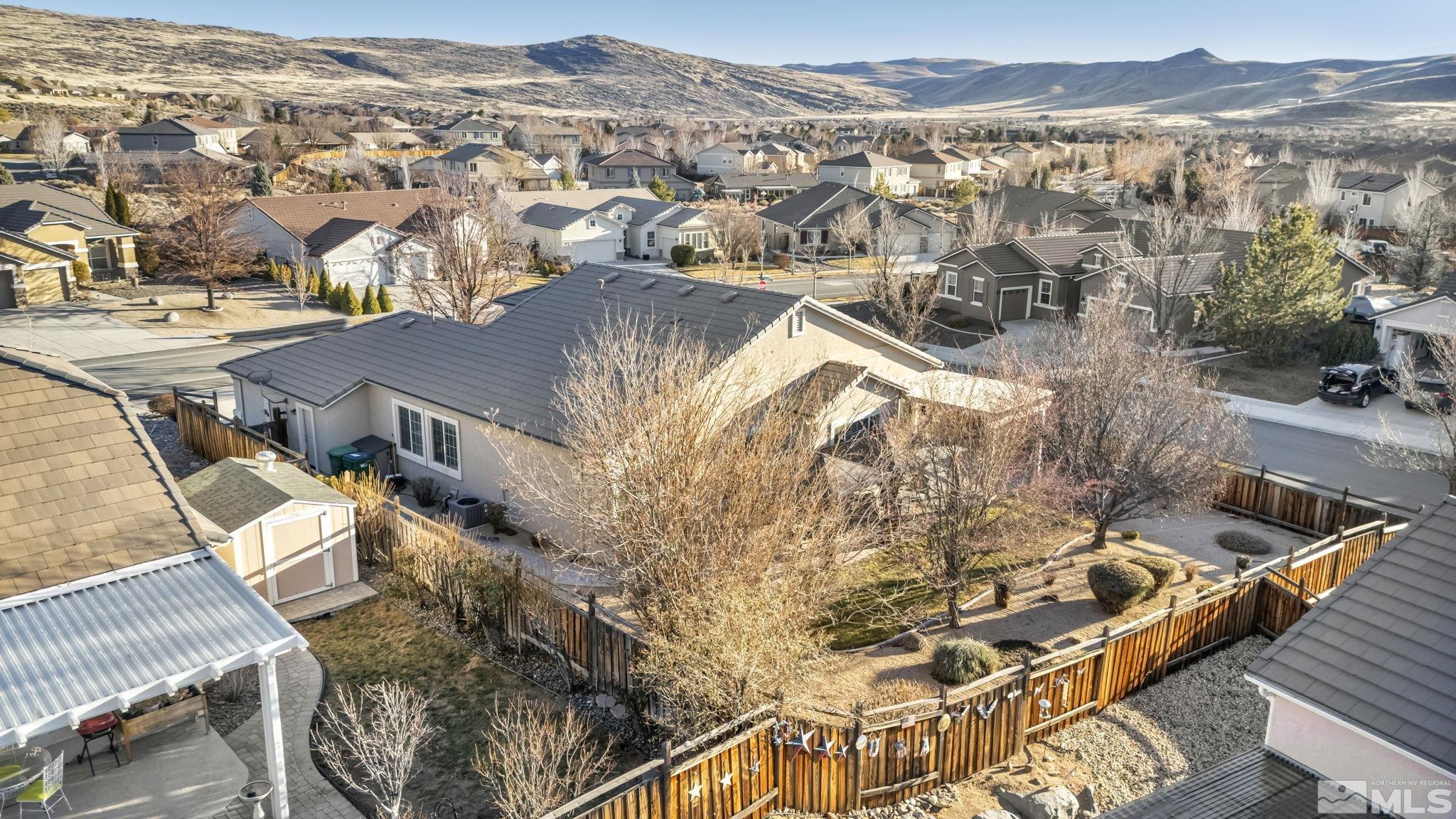 7301 Lacerta Drive Sparks, NV 89436 - Photo 38 of 39 an aerial view of residential houses with outdoor space