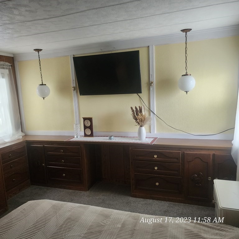 22 Windbrook Drive Auburn, MA 01501 - Photo 12 of 19 a bathroom with a sink and a mirror