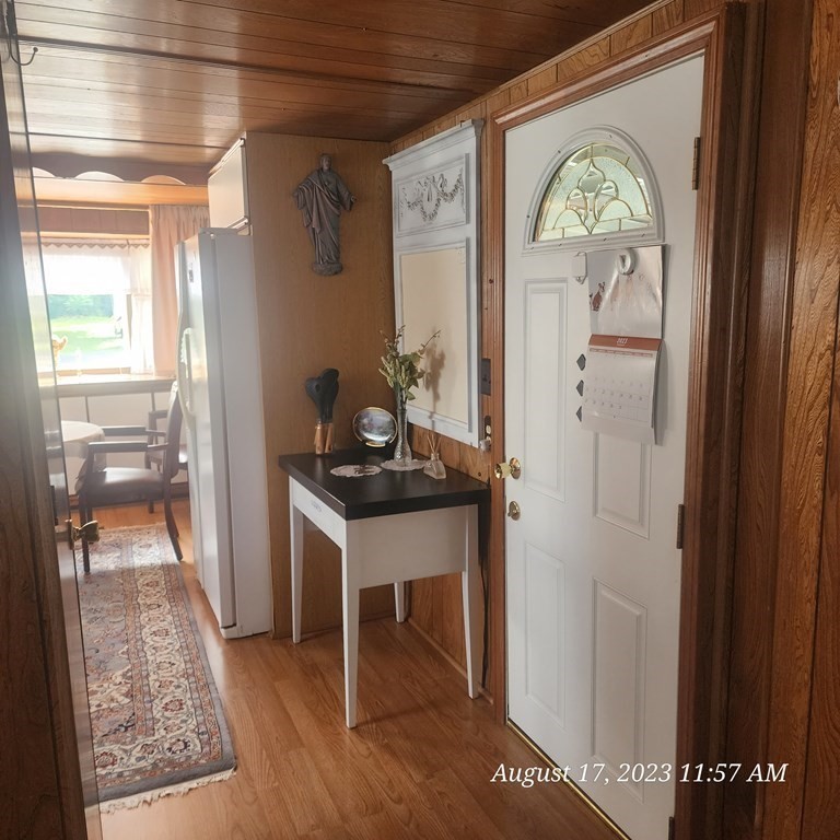 22 Windbrook Drive Auburn, MA 01501 - Photo 15 of 19 a view of a hallway and a livingroom with furniture
