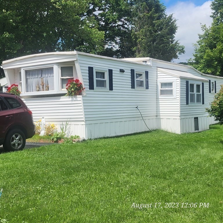 22 Windbrook Drive Auburn, MA 01501 - Photo 2 of 19 a view of a house with a backyard