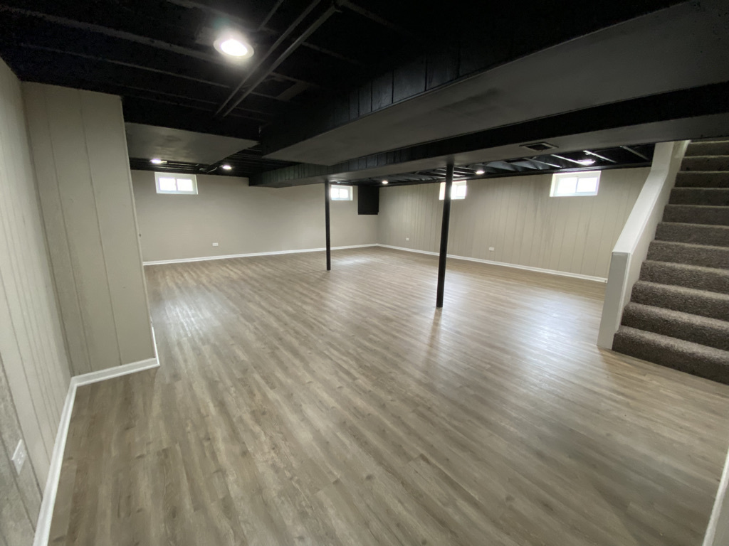 201 Pine Street Villa Park, IL 60181 - Photo 12 of 17 a view of an empty room with wooden floor