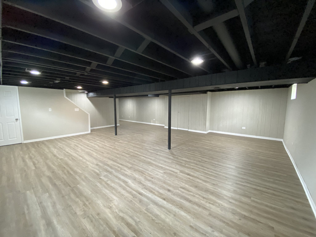 201 Pine Street Villa Park, IL 60181 - Photo 13 of 17 a view of an empty room with wooden floor