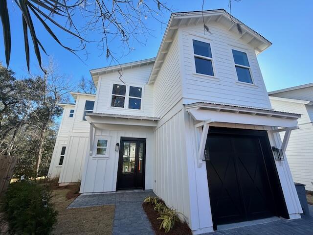 56 Rearden Way Santa Rosa Beach, FL 32459 - Photo 1 of 8 a front view of a house with entryway