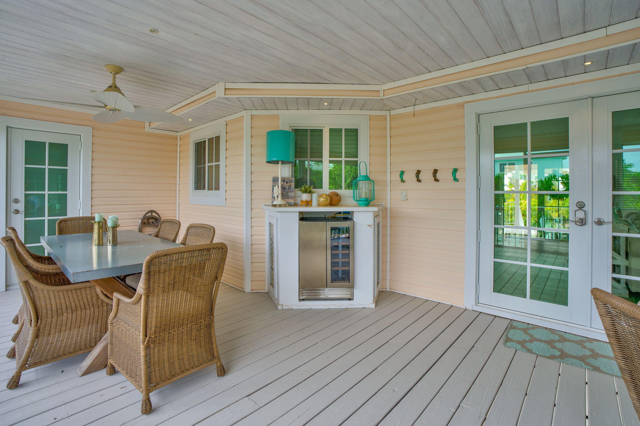 1147 Flagship Drive Summerland Key, FL 33042 - Photo 14 of 53 a dining room with furniture and wooden floor