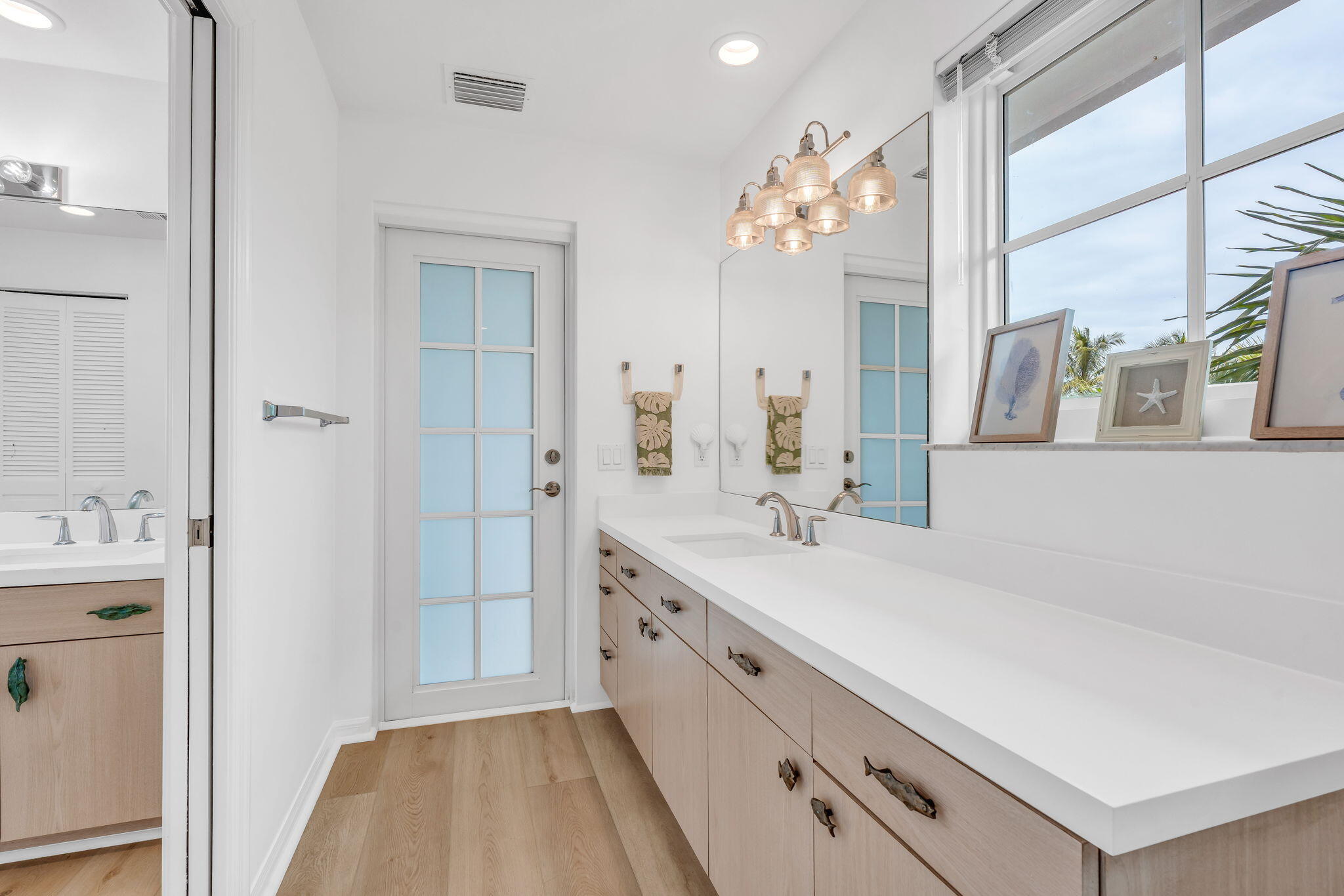 1147 Flagship Drive Summerland Key, FL 33042 - Photo 24 of 53 a spacious bathroom with a double vanity sink mirror and